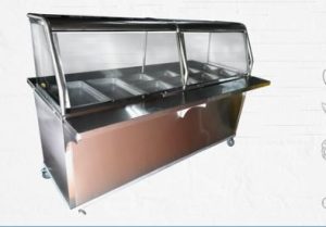 "Baño María de 06 panas Full   calientes, Fabricado en Galván. Repisa, Top  y pasamanos en acero  Inoxidable  430.  Vidrio Frontal y lateral.  Entrepaño, faldon  y rodos.
 Medidas: 87"" x 25"" x 35""."