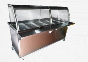 "Baño María tipo Vitrina de 06 panas Full   calientes, Fabricado en Galván. Techo y Top Acero Inoxidable  430, faldón largo,  entrepaño y rodos.
 Medidas: 87"" x 25"" x 35""."